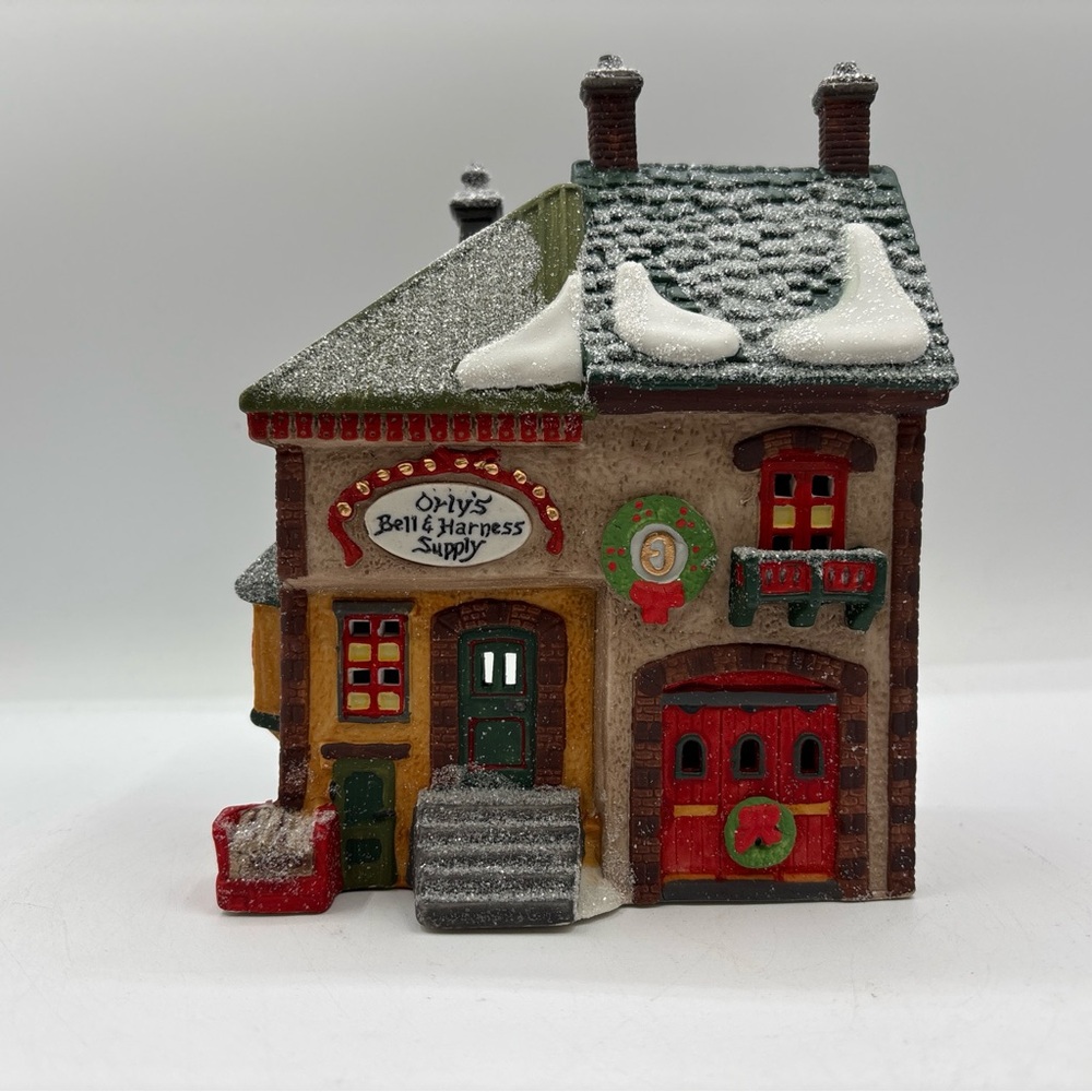 Department 56 1991 North Pole Series Orly’s Bell & Harness Supply 5621-9 Vintage